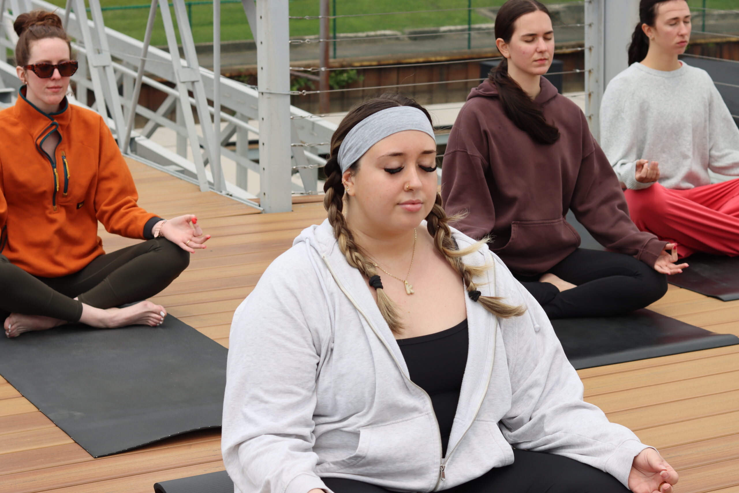 Woman doing yoga on Bill's Dock